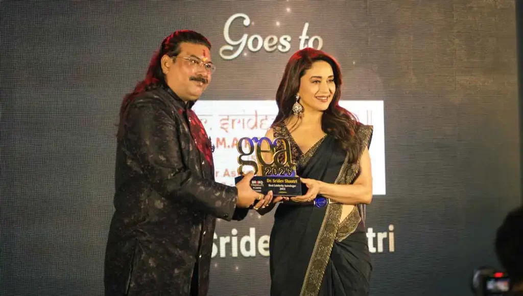 Best Celebrity Astrologer in India Award by Ms. Madhuri Dixit